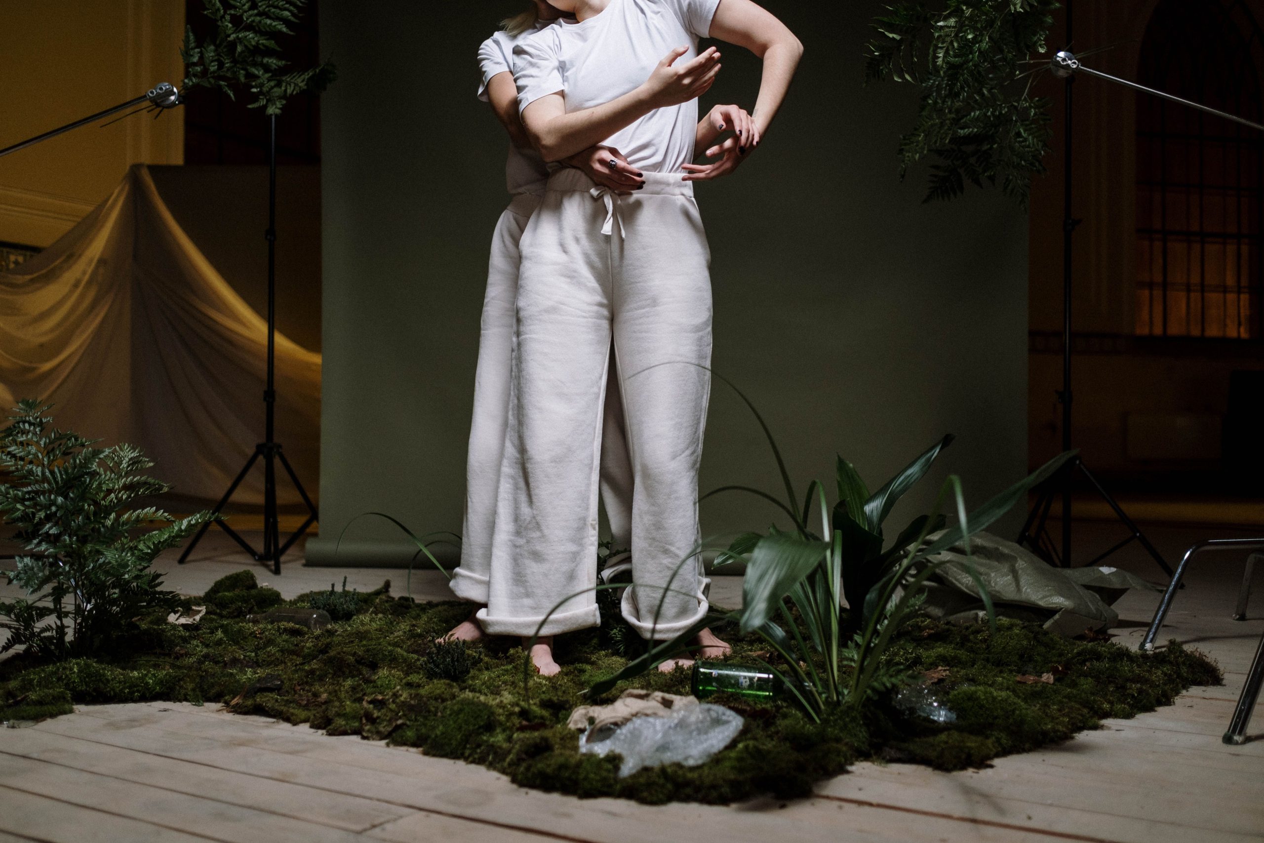 Embrace of nature with eco-friendly fashion in a studio environment.